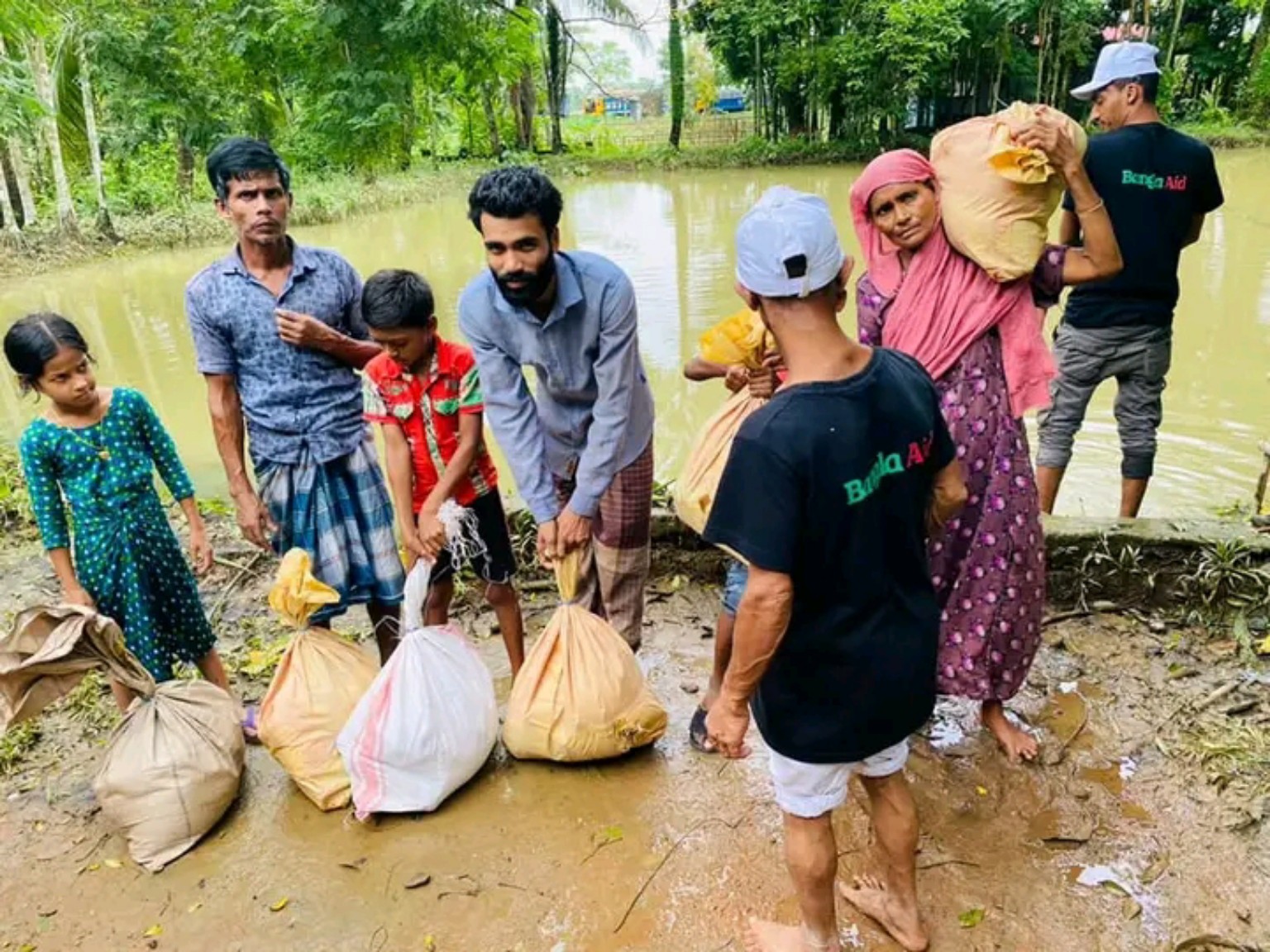 Community members receiving relief supplies
