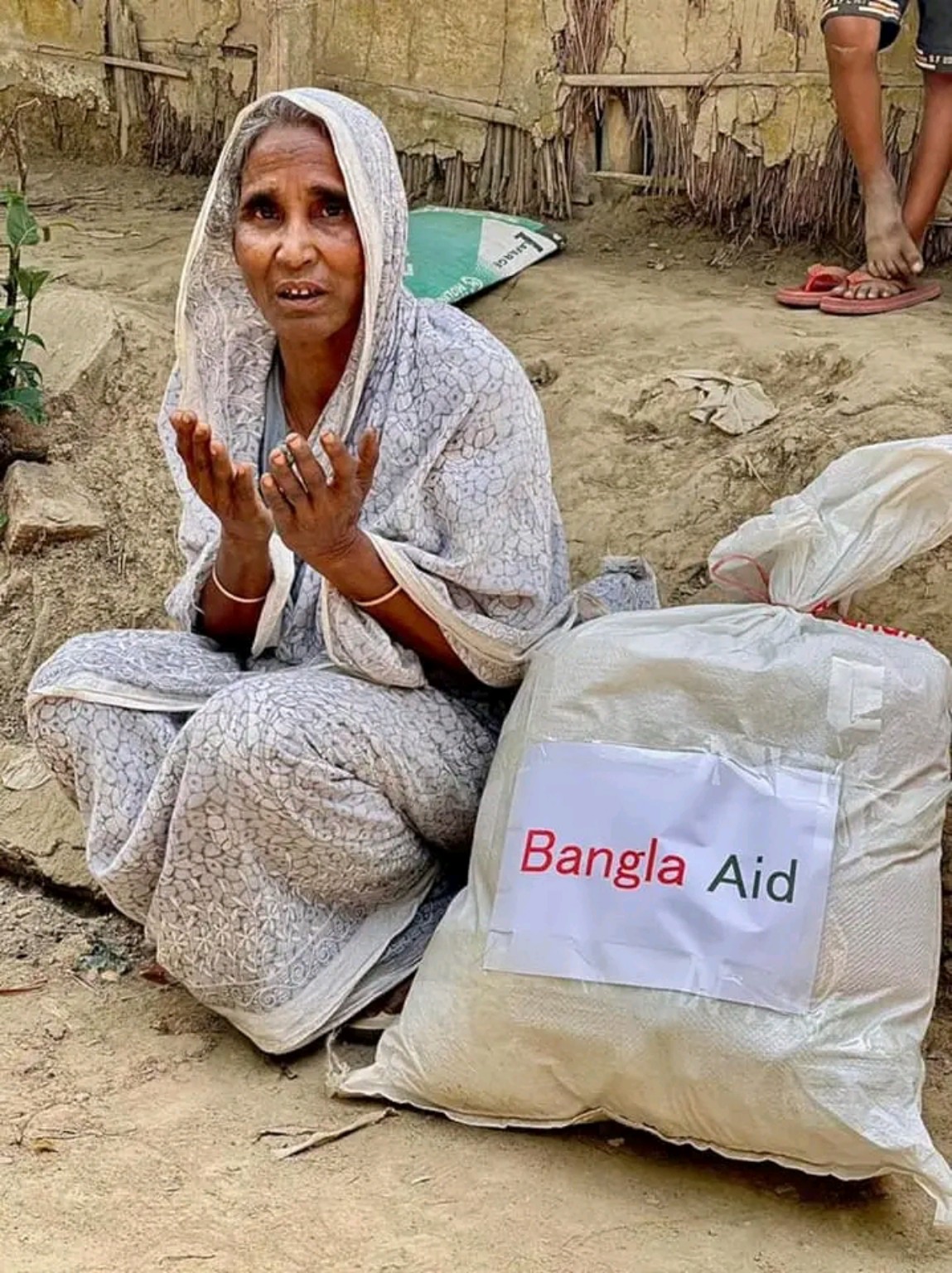 A family member receiving a bag of food support